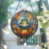 Frog Reading Stained Glass Suncatcher, Round Pumpkin Window Panel with Autumn Leaves and Book, Whimsical Fall Nature Home Decor Gift